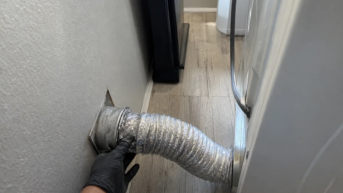 Matted lint removed from an Orlando dryer vent during cleaning